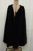 Vintage Selfridges black velvet opera cloak lined with red satin, a Laurel 1980's tartan and black