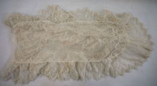 19th century lace shawl measuring 250cm long approx. x 36cm wide to the edge of the lace
