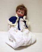 German bisque head doll, composition body, sleeping eyes, marked to back of head 22-12