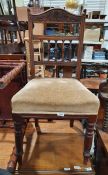 20th century mahogany ladderback dining chair with carved scrollwork decoration, on turned legs