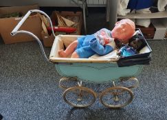 Two dolls and a pram (3)