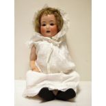 German bisque head doll, composition body, sleeping eyes, open mouth and teeth, marked to reverse