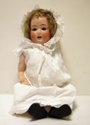 German bisque head doll, composition body, sleeping eyes, open mouth and teeth, marked to reverse