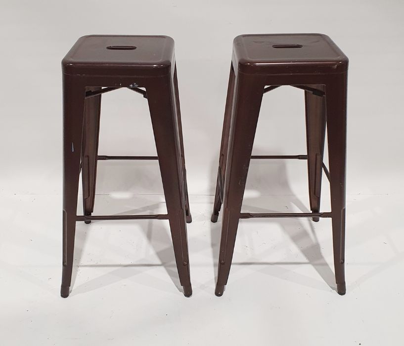 Two 20th century metal stacking stools (2)