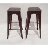 Two 20th century metal stacking stools (2)