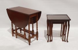 20th century nest of three tables with glazed tops, on cabriole legs, 50cm x 37.5cm x 56cm and an