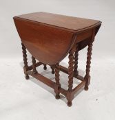 Oak drop-leaf table on barleytwist supports