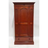 20th century mahogany single door wardrobe with moulded cornice above single panelled door, single