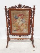 19th century needlework firescreen with carved and turned walnut frame and floral spray