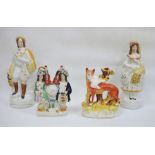 Four 19th century Staffordshire flatback pottery models, one of fox as a spill vase, another of