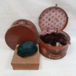 Two vintage leather hat boxes, a quantity of fur stoles and a green feather hat