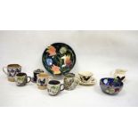 Nicholas Mosse pottery cream jug and one further, a Bridgewater teacup, saucer and cream jug, a