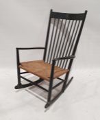 Black painted stickback string-seated rocking chair  Condition ReportSome surface scratches,