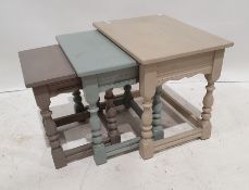 Nest of three painted tables