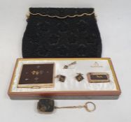 Buiktons set of cigarette case, lighter, etc, and a beaded evening purse