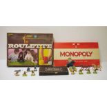 A quantity of toy soldiers, Bussey's table croquet, boxed games to include Cluedo and Monopoly