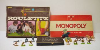 A quantity of toy soldiers, Bussey's table croquet, boxed games to include Cluedo and Monopoly