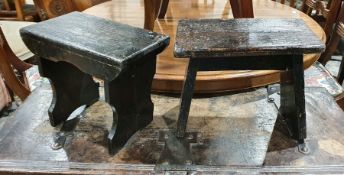 Two similar black painted stools (2)