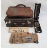 Vintage doctor's leather suitcase with fitted interior and medical accessories, a leather doctor's
