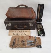 Vintage doctor's leather suitcase with fitted interior and medical accessories, a leather doctor's
