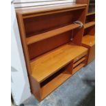 Mid century modern teak lounge unit with assorted shelves and drawer, on plinth base, 130cm x 140cm