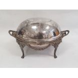 Silver plated breakfast dish of usual oval form with revolving cover decorated with floral swags,