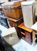 Two gilt Lloyd Loom laundry baskets and a 20th century bedroom chest of three short drawers and