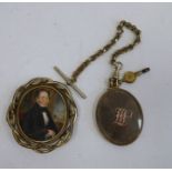 Victorian gilt metal brooch set with a half-length miniature portrait of a gentleman with book