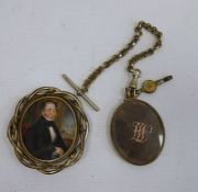 Victorian gilt metal brooch set with a half-length miniature portrait of a gentleman with book