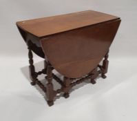 20th century oak oval top gateleg table on turned block legs, 97cm x 49cm x 74cm