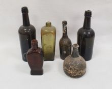 Pair of probably late 19th century glass wine bottles, one stamped 'Bristol' to base, a small