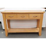 20th century oak hall table, the rectangular top above three drawers, over shelved undertier,