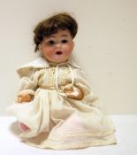 German bisque porcelain headed doll with sleeping eyes and open mouth, composition body, 38cm high