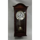 Comitti of London modern mahogany-cased wall clock