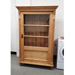 Vintage pine cabinet, the moulded cornice above glazed door, on shaped supports  Condition