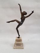 Art Deco style bronze figure of a dancing nude female, on stepped marble base, 40cm high