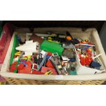 A large quantity of loose Lego, one basket, a blue bucket and a box
