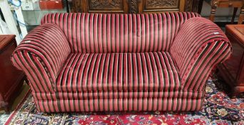 Modern two-seat sofa in red and black striped upholstery