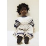 Simon & Halbig bisque headed mulatto girl doll, no.1079, in lace trimmed blue polka dot dress with