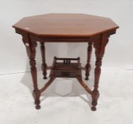 Possibly Edwardian octagonal centre table, on turned and ring supports, stretchered base