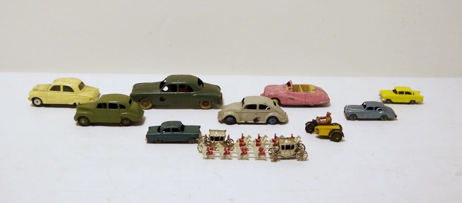 Quantity of loose Dinky Toys and others to include Dinky Toys pink Austin Atlantic, Matchbox