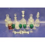 Five various decanters, four green and clear etched stemmed wines with floral swag decoration, two