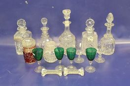 Five various decanters, four green and clear etched stemmed wines with floral swag decoration, two