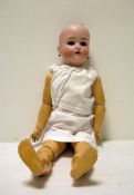 Simon and Halbig/Kammer and Reinhardt bisque headed doll with jointed composition body, pierced