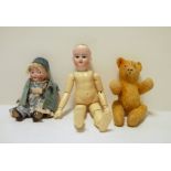 Miniature bisque shoulderhead doll with googly eyes, small German bisque-headed doll with jointed