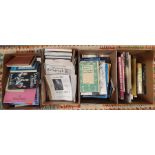 Four boxes of assorted books (4 boxes)