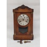 Early 20th century mahogany bracket clock with Roman numerals to the steel dial, on plinth base