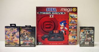Sega Mega Drive II mega 6 boxed with three games 'Streets of Rage II', 'World of Illusion' and '