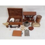 African metal bangle cuff with brass pins, an oak pipe rack, an engraved brass box, a hardwood box