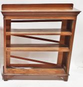 20th century stained oak open bookcase on bracket feet